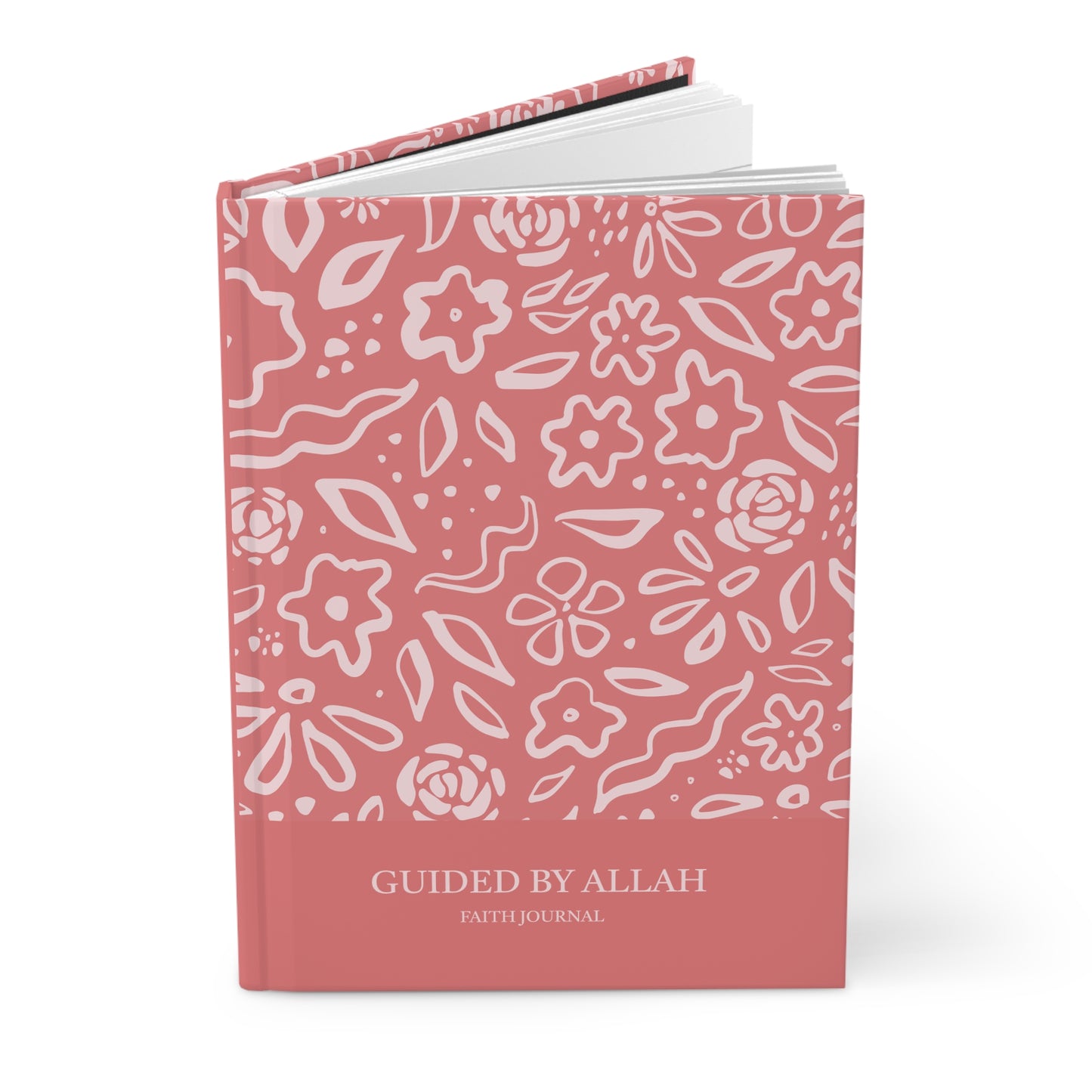 Angled view of Pink Muslimah journal with floral pattern and 'Guided by Allah' text. 