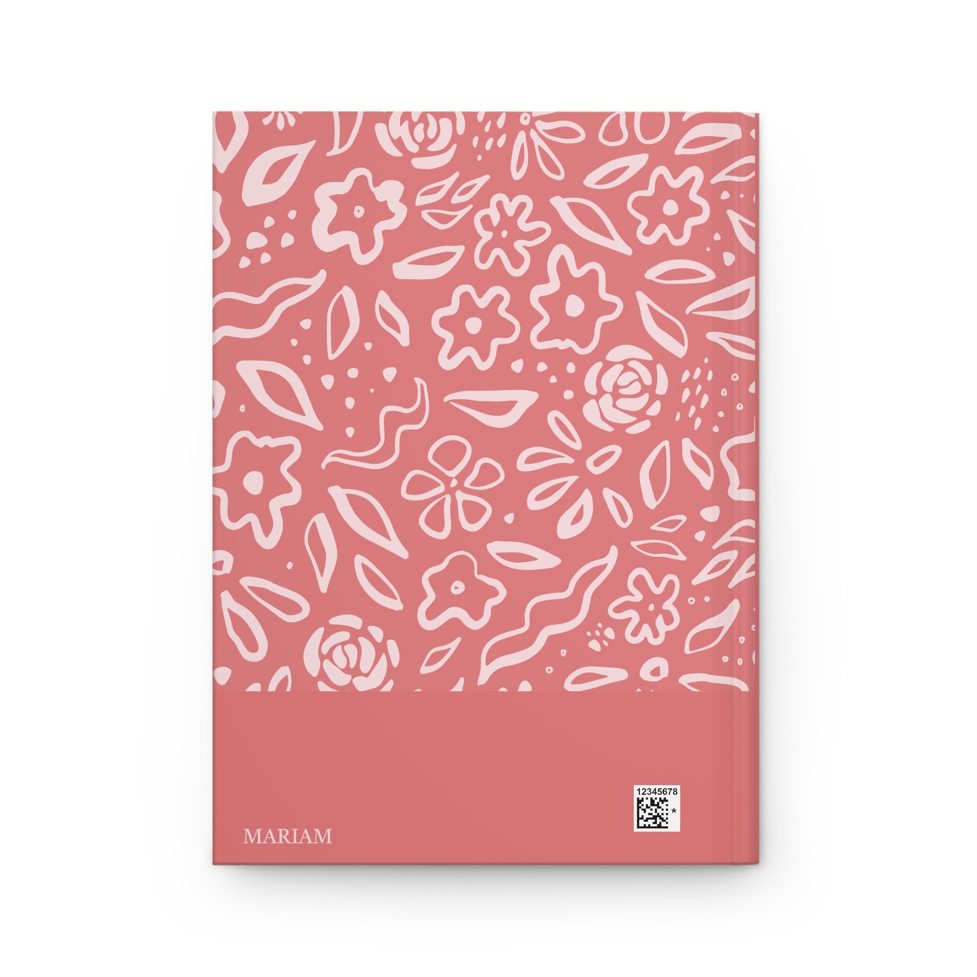 Muslimah journal with floral pattern on a pink back cover.