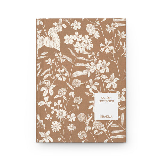 Quran notebook with white floral art on a brown background and a personalizable name "KHADIJA."