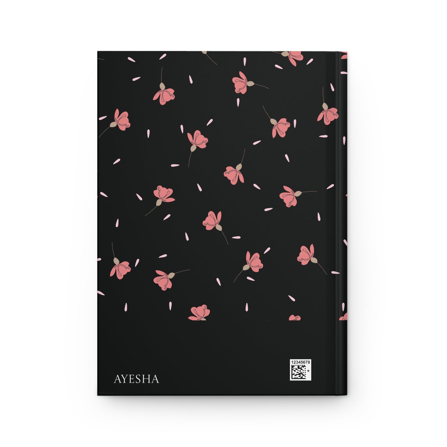 Back view of Revert journal featuring floral design with Personalizable name "AYESHA."