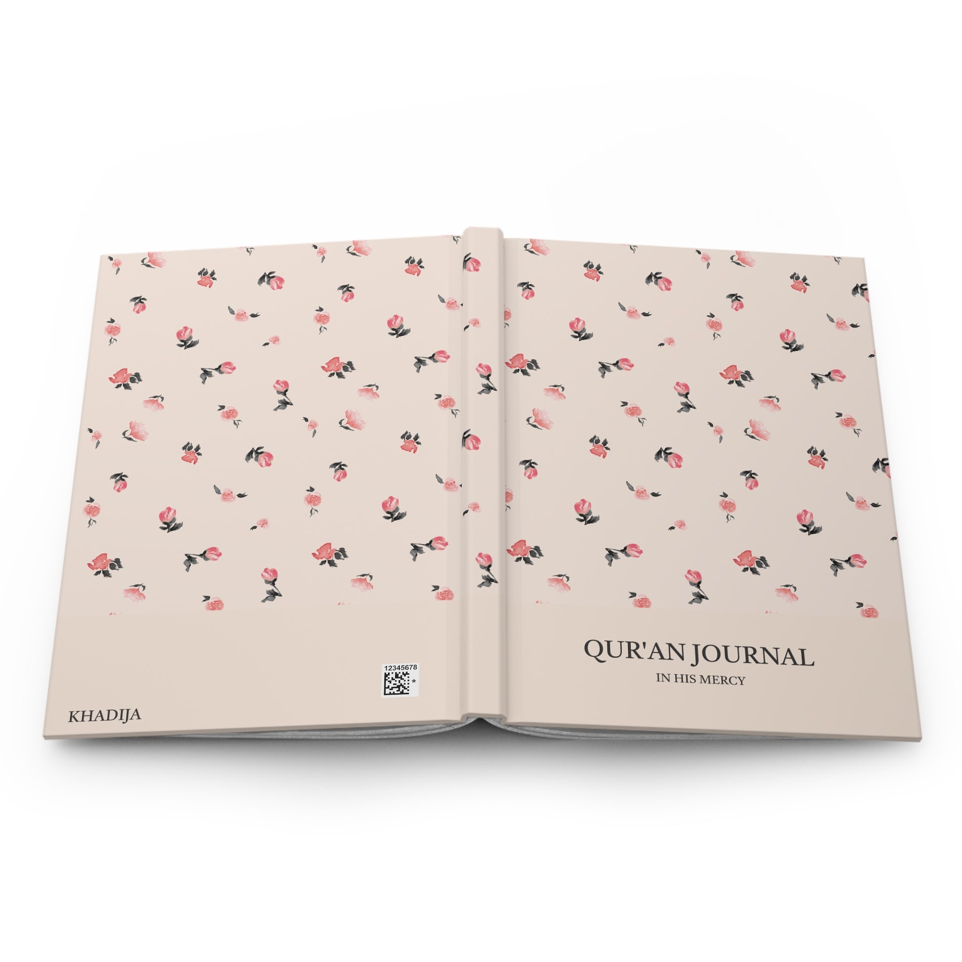 Full open layout of floral Quran journal displaying front and back covers together.