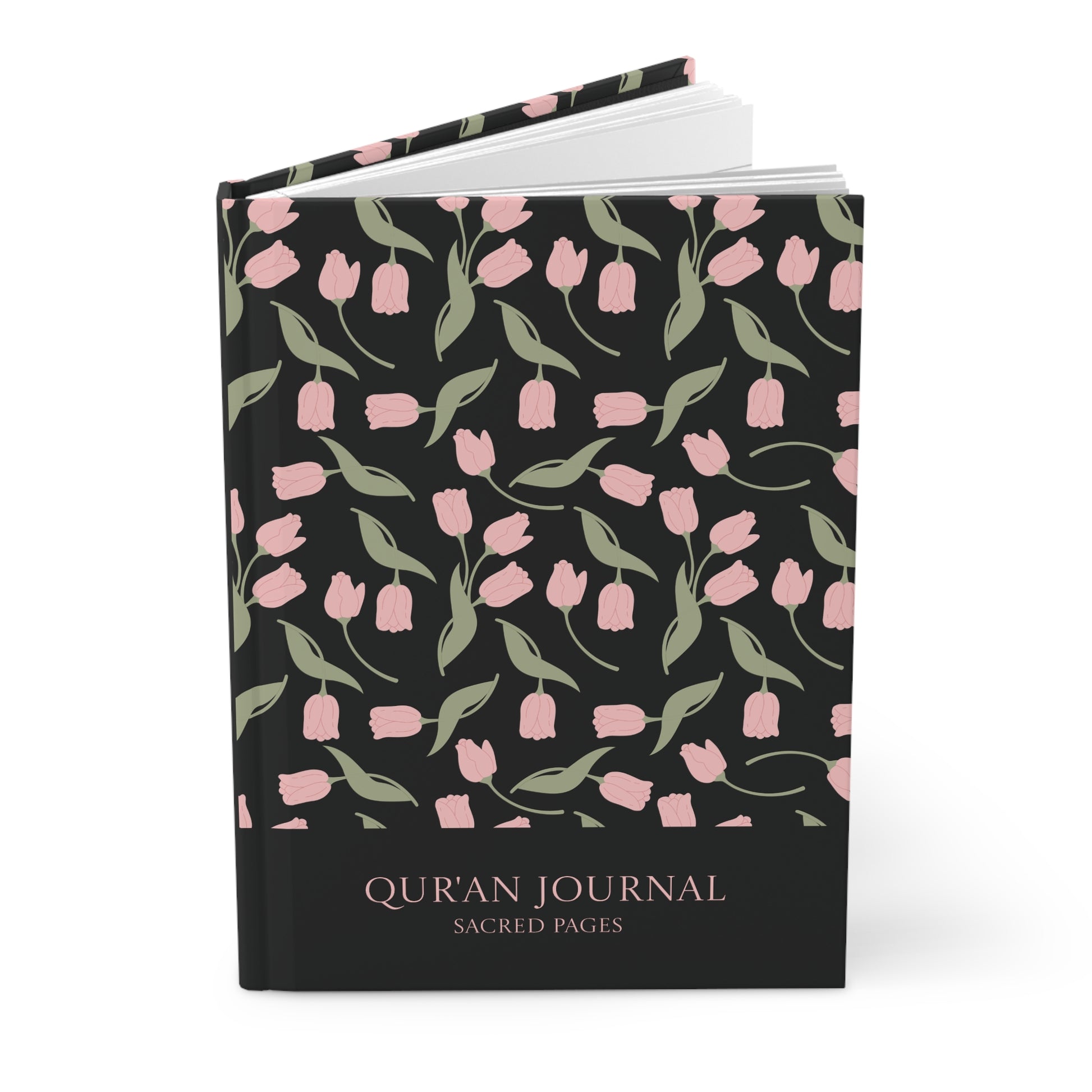 Angled view of a black Qur'an journal with pink floral tulip pattern and hardcover finish.