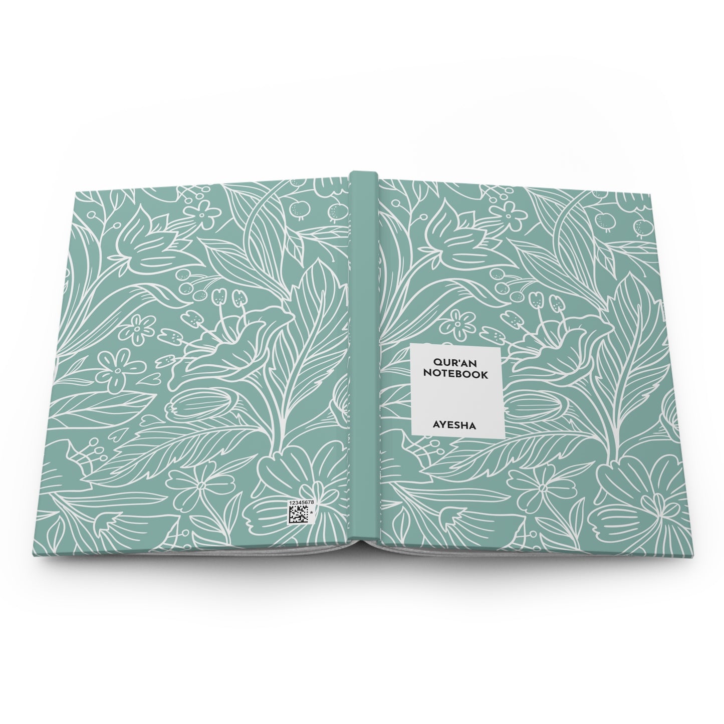 Personalized Quran journal lying open with both covers visible